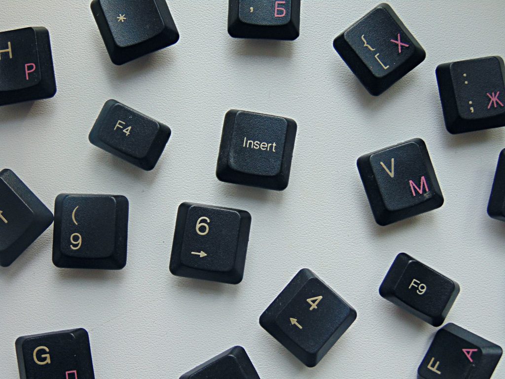 Letter, number and keyboard keys on a white background